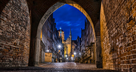 Amazing architecture of the Mariacka street in the old town in Gdansk at night, Poland.