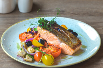 grilled fish salmon with vegetables, color food, healthy, tomatoe, olive, fresh food, serving , restaurant