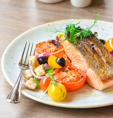 grilled fish salmon with vegetables, color food, healthy, tomatoe, olive, fresh food, serving , restaurant