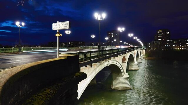 Timelapse Bridge of Catalans (Amidonniers Bridge) is Toulouse, France bridge crossing Garonne river. It is bridge in arch and stone and reinforced concrete inaugurated in 1908. Architect Paul Sejourne