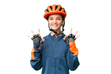 Teenager cyclist girl over isolated chroma key background showing an ok sign with fingers