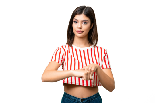 Young Russian woman over isolated chroma key background making the gesture of being late
