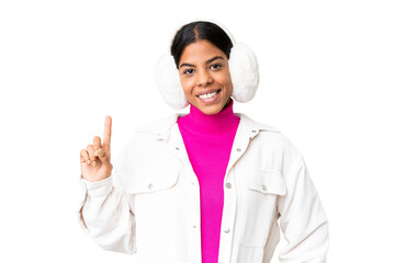 Young African American woman wearing winter muffs over isolated chroma key background showing and...