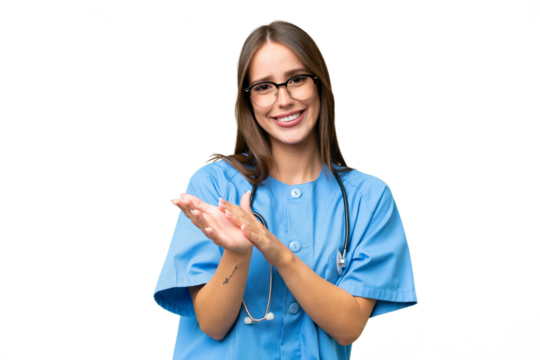 Young nurse caucasian woman over isolated background applauding after presentation in a conference