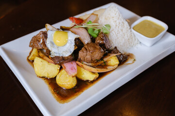 A delicious plate of Lomo Saltado in Lima Peru