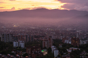 Fototapeta premium A beautiful sunset over Medellin, Colombia with distant mountains
