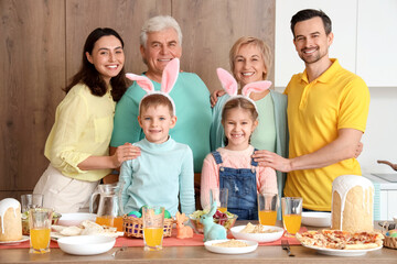 Big family at Easter dinner in kitchen