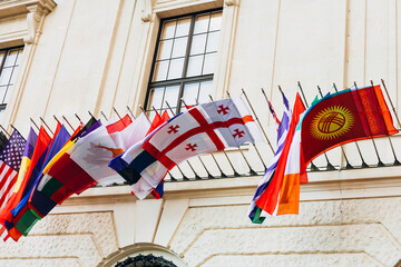 National flags of various countries flying in the wind. Colorful flags from different countries. Flags Organization for Security and Co-operation in Europe