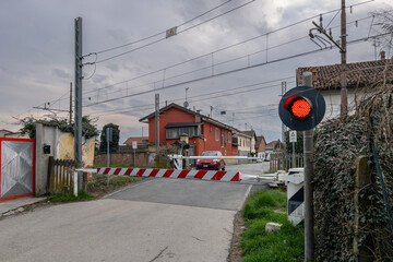 Sommariva del Bosco, Italy: Level crossing closed with red light on SFM4 Alba - Turin - Caselle...