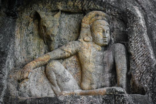 Man and the Horse Head stone carving in Isurumuniya, Anuradhapura, Sri Lanka.