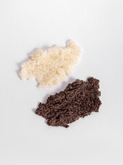 Smears of white and brown scrub. Natural salt or sugar scrubs