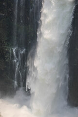 Water flowing down the cliffs of Victoria Falls - obrazy, fototapety, plakaty