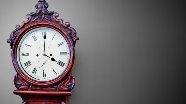 Old cherry wood grandfather clock, timepiece, time, timeless, time passing, antique, pendulum, on a gray background