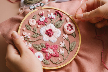 hand-embroidered flowers in an embroidery frame