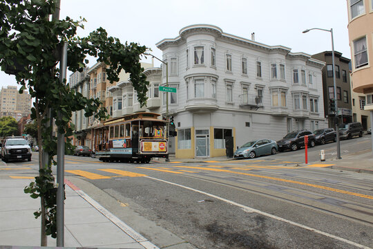San Francisco, California, USA, June 29, 2022: Classic view of historic San Francisco Cable Car on famous Mason Street.