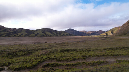 Obraz premium Landmannalaugar is a location in Iceland's Fjallabak Nature Reserve in the Highlands. It is on the edge of the Laugahraun lava field. This lava field was formed by an eruption in 1477.