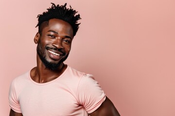 Obraz premium Black Man in Pink Shirt on a pink background.