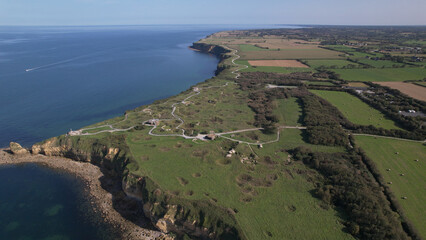 The World War II Pointe du Hoc Ranger Monument. Pointe du Hoc is a high point between two of the...