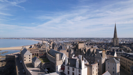 The Breton Coastal Medieval Fortified City of Saint-Malo, France. The ramparts of Saint-Malo represent granite walls that surround the city and are built on a rock.