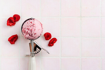 Raspberry ice cream in a scoop