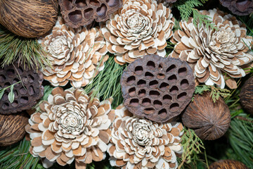 seasonal crafting blossoms made of wood combined with dried lotus seed pods