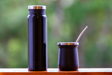 Traditional yerba mate tererê, Ilex paraguariensis, in selective focus. chimarrão