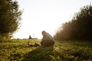 dog and man in nature