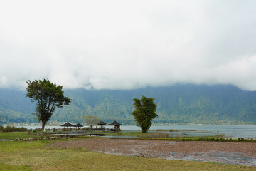 Mountain Lake Bratan in cloudy weather on the popular island of Bali.
