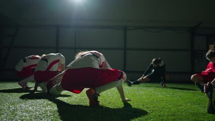 Sports Workout Of Junior Girls Soccer Team, Football Players Stretching Legs For Keeping Fit - Powered by Adobe