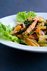Shanghai Salad served on a white plate, social media post, food photography, fine dining, blue background, restaurant menu, Healthy, lifestyle, diet, vegan