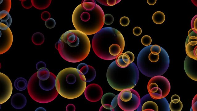 Abstract moving colorful flying spheres on black. Colorful rainbow balls in different sizes. Motion animation background 4k