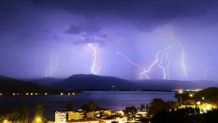 Naklejka na ściany i meble lightning over the lake