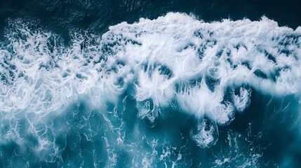 foamy waves rolling up in ocean