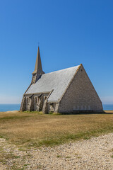 Fototapeta na wymiar Church Notre Dame de la Garde (1856), chapel dedicated to Blessed Virgin. Etretat, Normandy, France, Europe.