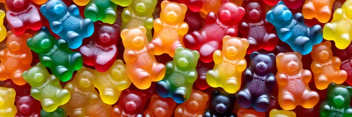 Fotobehang Colorful background made of gummy bears. View from above. Jelly candy background © DAndreev