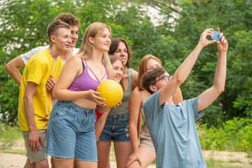 a group of young students having fun in nature - 749657031