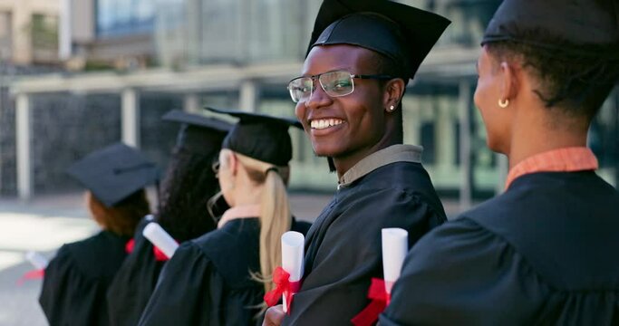 Smile, graduation and face of black man with students at university in line with diploma, degree or scroll. Happy, education and portrait of African person waiting with college certificate at school.