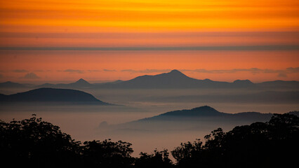 red sunset over australian mountains in main range national park seen from famous steamers trail...
