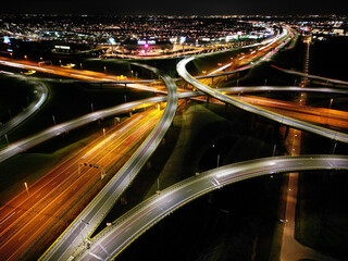 Fototapeta na wymiar Aerial view at night of a cloverleaf interchange highway, The Haque, Holland