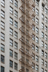 Facade of an apartments building with fire stairs.