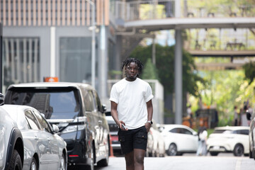 Portrait of young African American male in the city outdoor. Young black male people at outdoor. Fashion concept