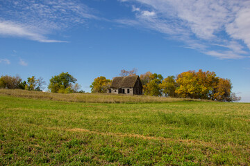 abandoned farm house in autumn