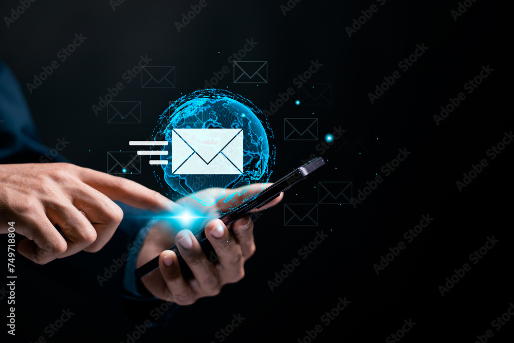 Aufkleber email marketing concept. businessman use smartphone sending email or digital newsletter to customer.