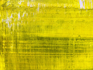 bright yellow hand painted canvas. abstract art textured background.