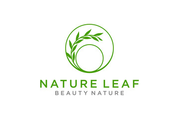 Nature environment logo design with circular green leaves.
