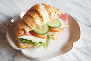 Sandwich With Smoked Chicken Salami on table 