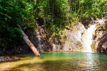 Tonpariwat Waterfall (Nam Tok Song Phraek) natural tourism place in Phang nga Thailand - obrazy, fototapety, plakaty