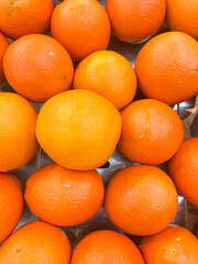 Orange fruit background. Fresh healthy orange fruit