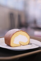 Japanese roll cake, close up japanese roll cake in dish


