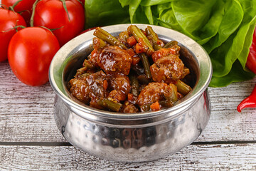 Meatball with vegetables and spices